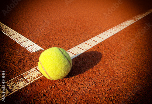 Tennis Ball on a tennis court with copy space