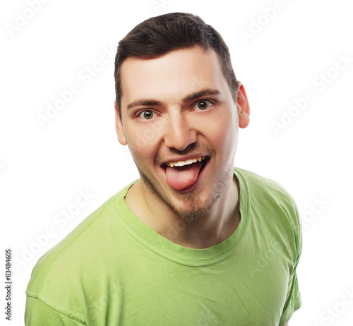 happy young man in green t-shirt