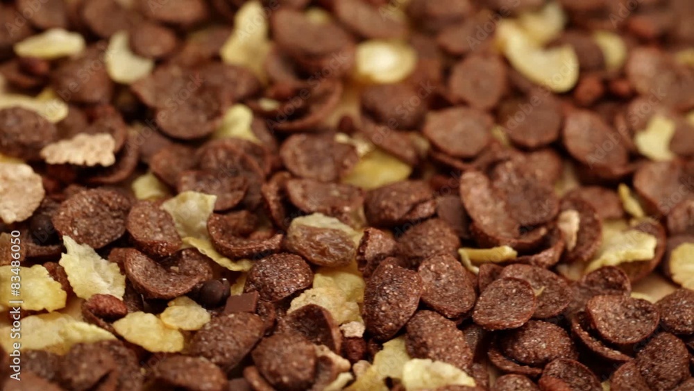 Cereal breakfast: chocolate muesli in bowl, closeup Cereal breakfast: chocolate muesli in bowl, closeup