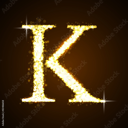 Alphabets K of gold glittering stars