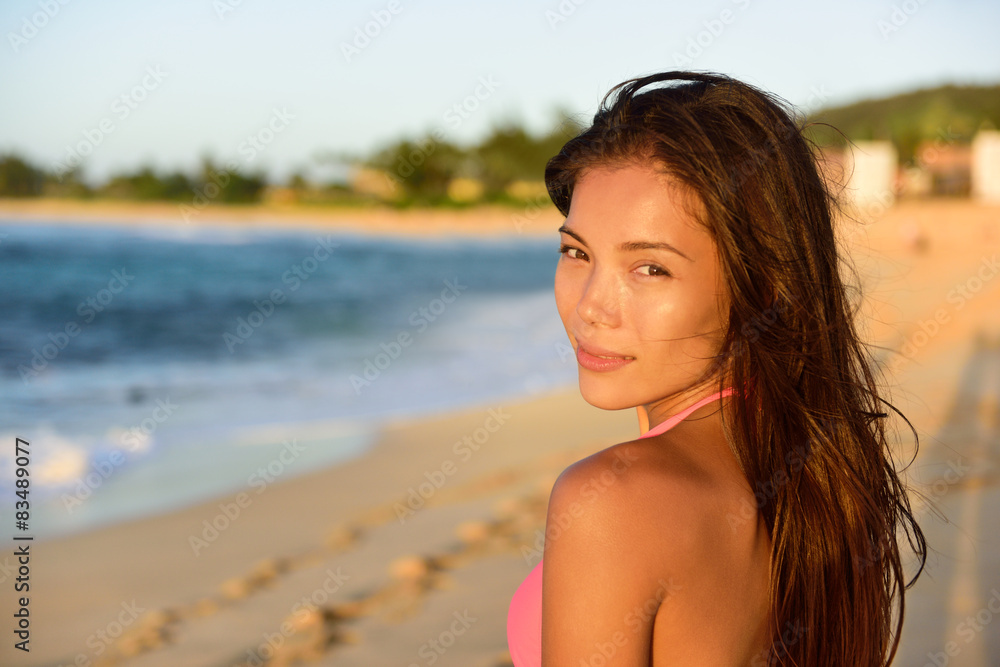 Portrait of beautiful mixed race woman on beach Portrait of beautiful mixed race woman on beach