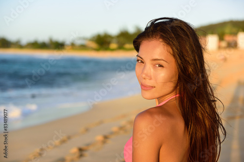 Portrait of beautiful mixed race woman on beach