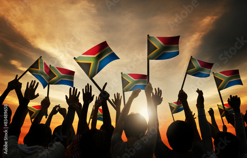 Konstfotografi Group of People Waving South African Flags in Back Lit