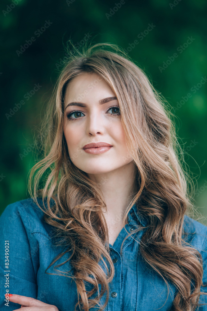 portrait of a beautiful blonde outdoors in the park portrait of a beautiful blonde outdoors in the park