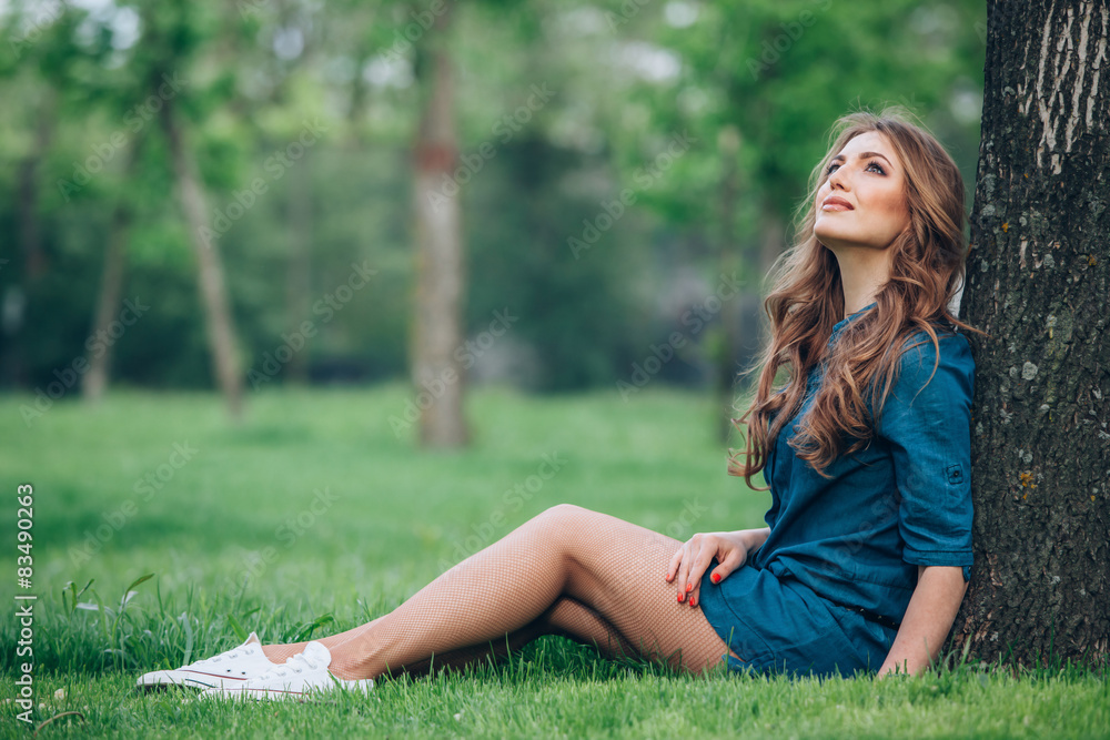 portrait of a beautiful blonde outdoors in the park portrait of a beautiful blonde outdoors in the park