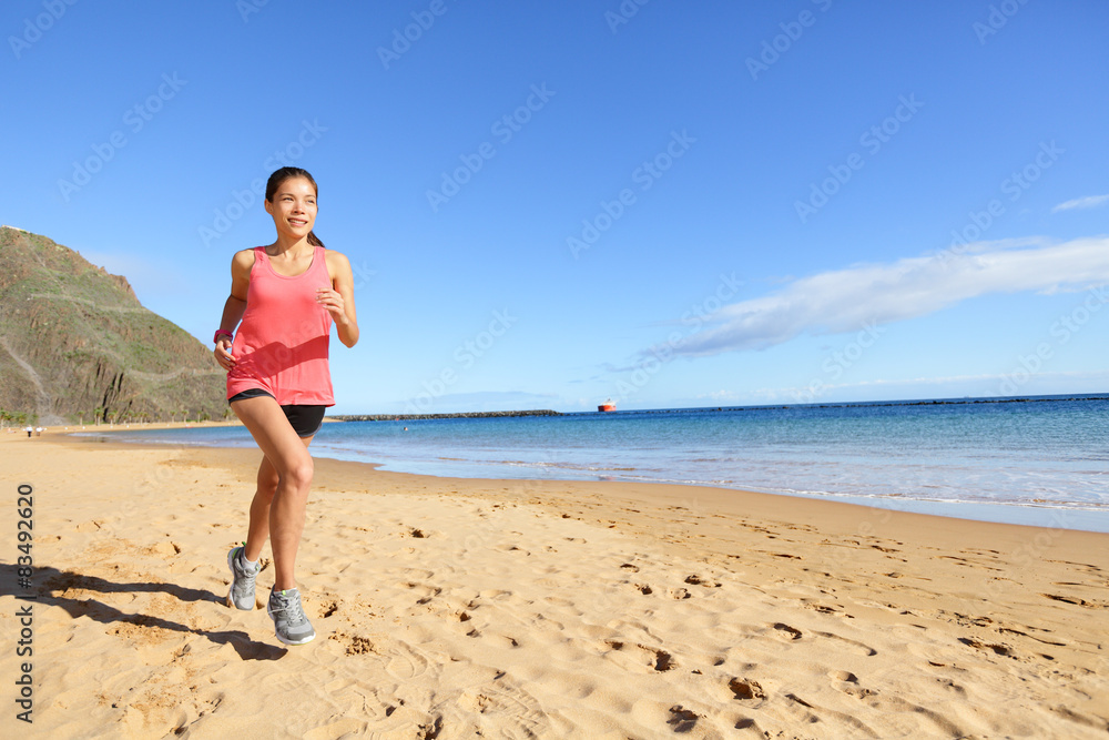 Jogging sports athlete runner woman on beach