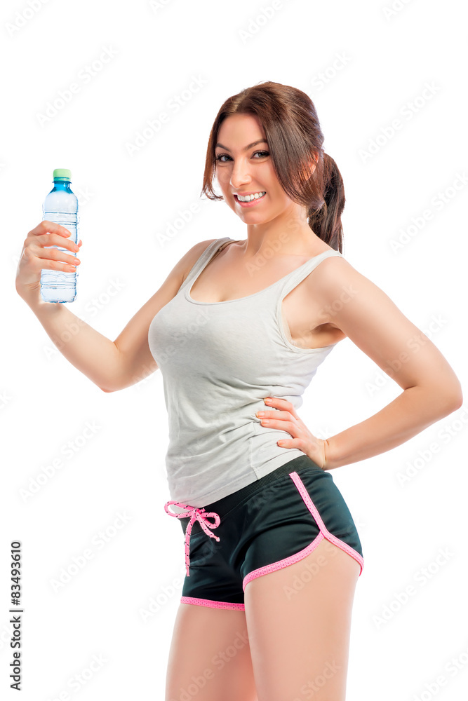 happy sportswoman with a bottle of pure water happy sportswoman with a bottle of pure water