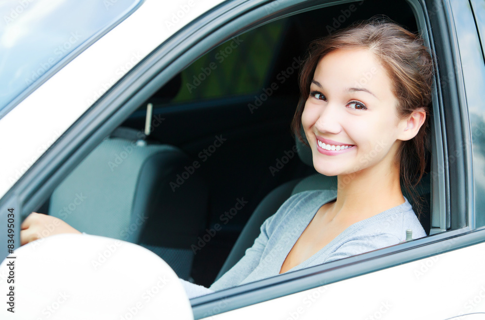 Pretty girl in a car