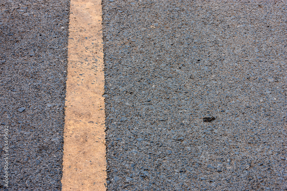 Fototapeta premium Asphalt road with yellow lines