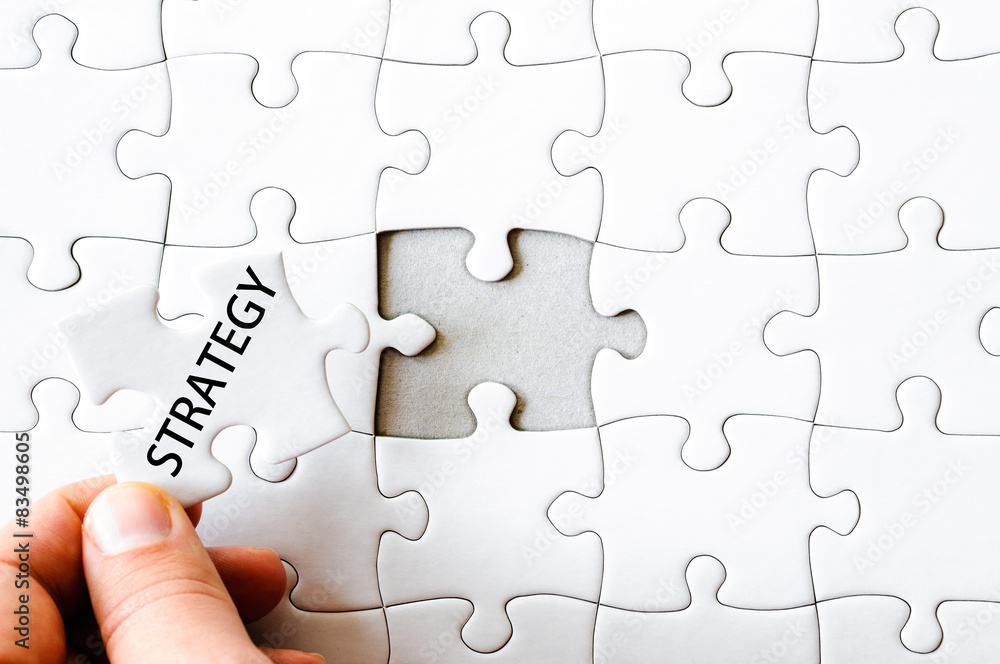 Missing jigsaw puzzle piece with word STRATEGY Missing jigsaw puzzle piece with word STRATEGY