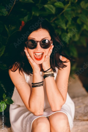 fashion outdoor photo of beautiful sensual woman with dark hair