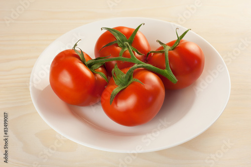 tomatos in plate © takoburito