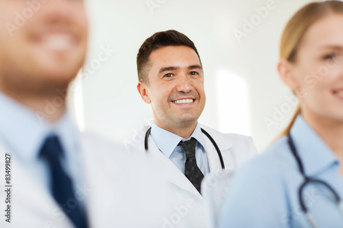 Wallpaper Mural happy doctor over group of medics at hospital Torontodigital.ca