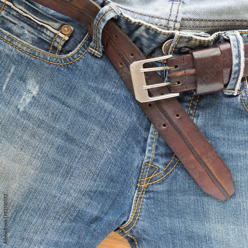 blue jeans with brown leather belt