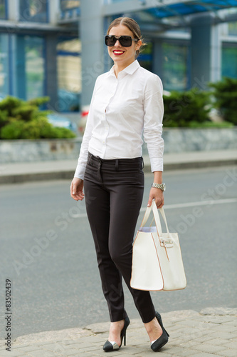 Business lady in the city © Tinatin