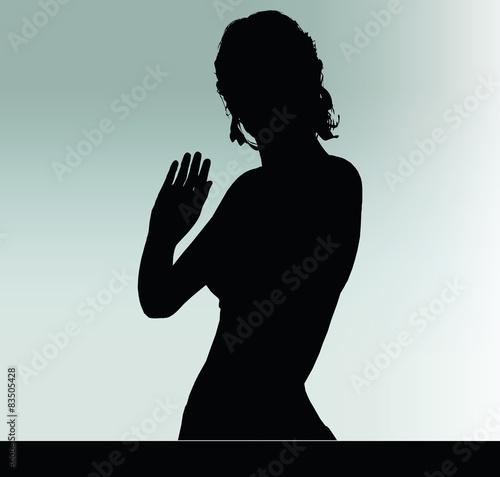 woman silhouette with hand gesture greet