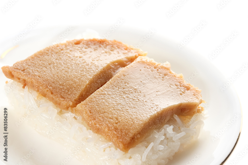 Thai custard with sticky rice on white