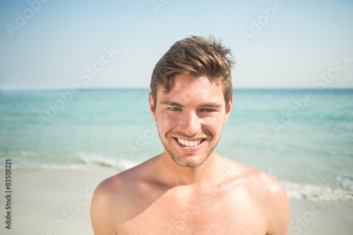 Happy man smiling at the camera