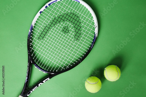 Tennis racquet and balls © sanneberg