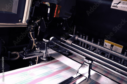 Printing machine during production output photo