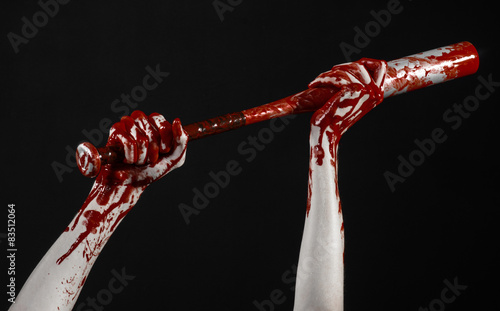 bloody hand holding a baseball bat, a bloody baseball bat