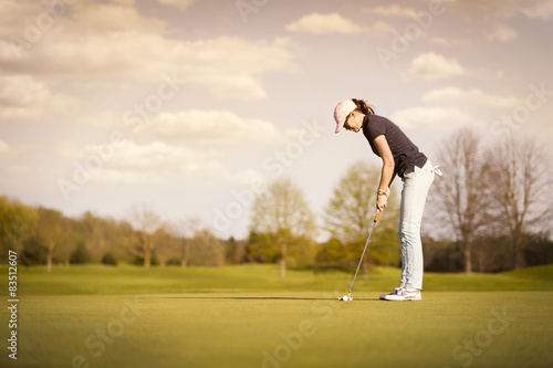 Female golf player with copyspace.
