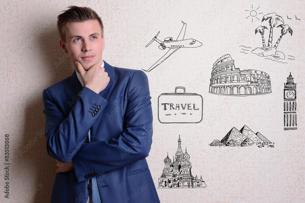 Dreaming concept. Portrait of businessman near wall Dreaming concept. Portrait of businessman near wall