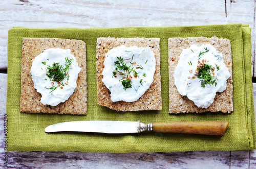 Rye loaves sandwich with homemade cottage cheese cream photo