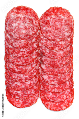 sliced salami on a white.