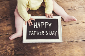 Fathers day composition. Studio shot on wooden background.