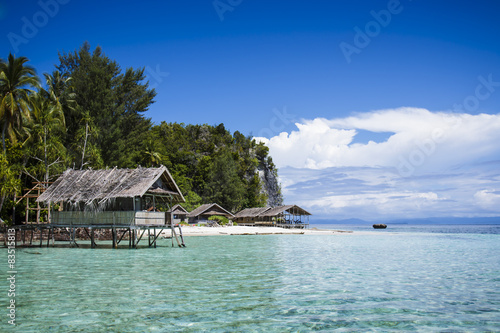 Water bungalows at west side of Kri Island in Raja Ampat