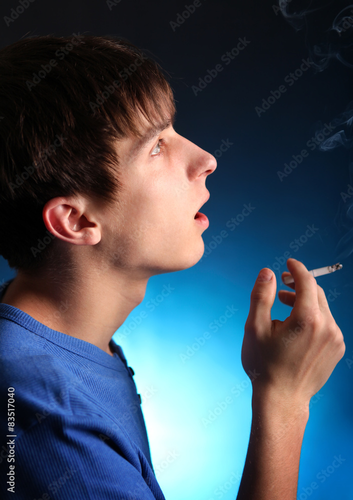 Fototapeta premium Young Man with Cigarette