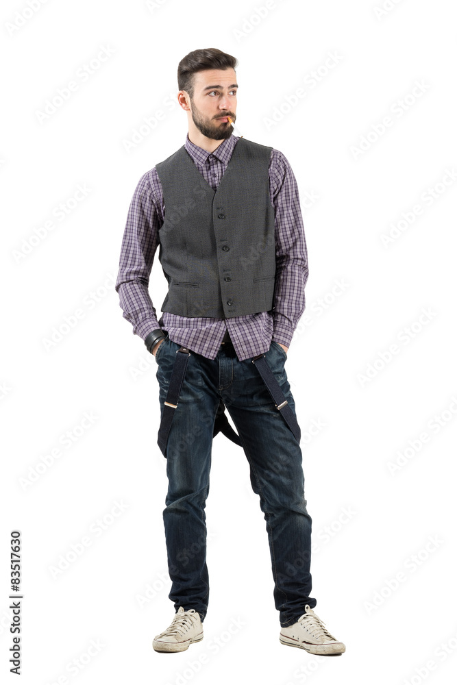 Bearded man with cigarette looking away Bearded man with cigarette looking away