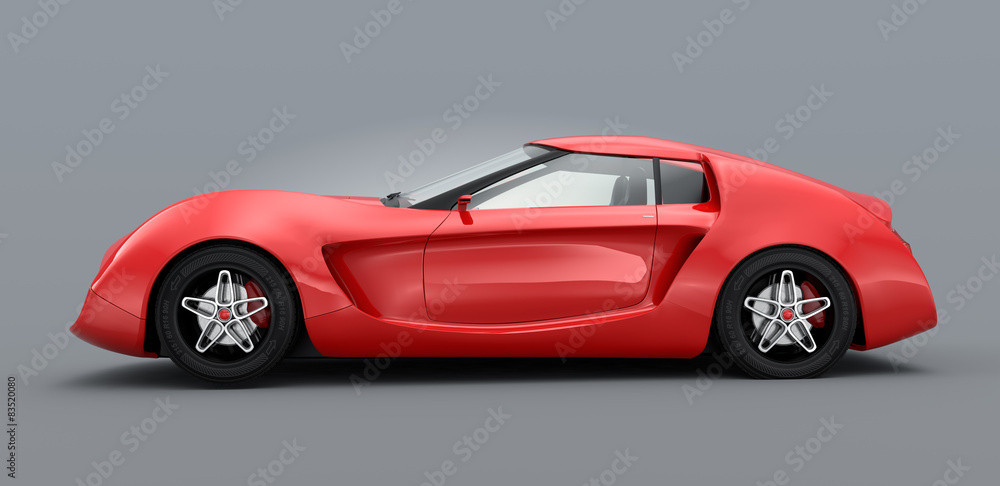 Red sports car on gray background.