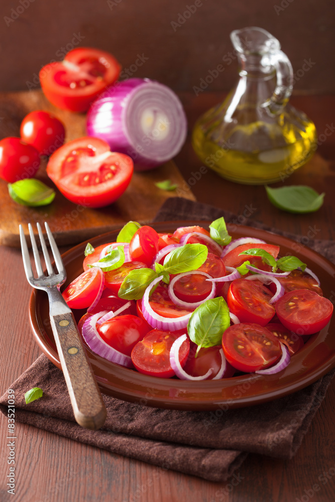 healthy tomato salad with onion basil olive oil and balsamic vin