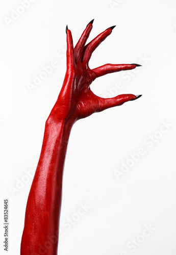 Red Devil's hands, red hands of Satan, white background isolated