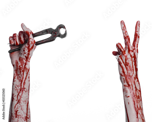 bloody hand holding a pliers on a white background