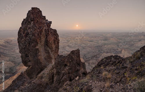 USA, Arizona, Kofa National Wildlife Refuge, Full Moon Rising from Castle Dome photo
