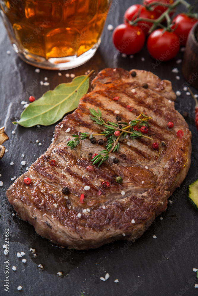 Beef steak on wooden table Beef steak on wooden table
