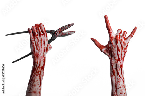 bloody hand holding a big old bloody scissors on a white backgr
