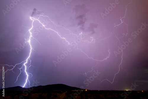 USA, Arizona, Maricopa County, Arlington, Thunder bolt over Scar Hill photo