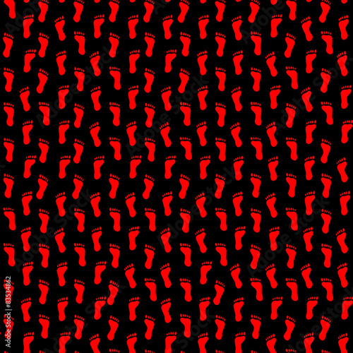 Footprints abstract pattern in red on a black background