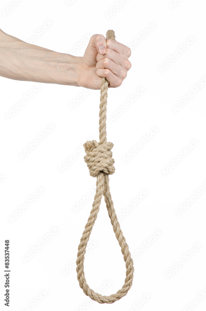man's hand holding a loop of rope for hanging on isolated