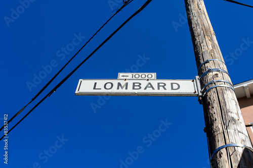 Direction sign under blue sky at San Francsico photo