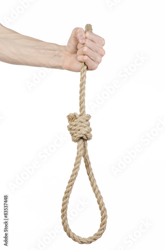 man's hand holding a loop of rope for hanging on isolated