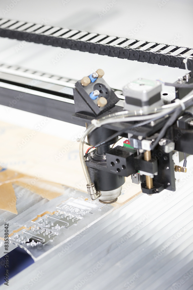 CNC Laser cutting machine cutting acrylic plate Stock Photo | Adobe Stock