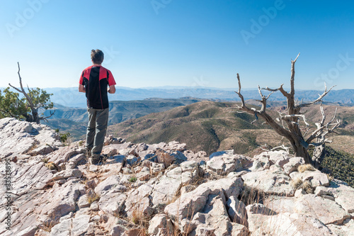 USA, Arizona, Mazatzal Wilderness, Hiker looking at hills photo