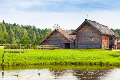 Russian wooden architecture, old rural houses © evannovostro
