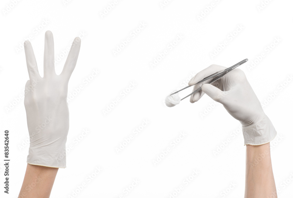doctor's hand in a glove holding tweezers with swab isolated 