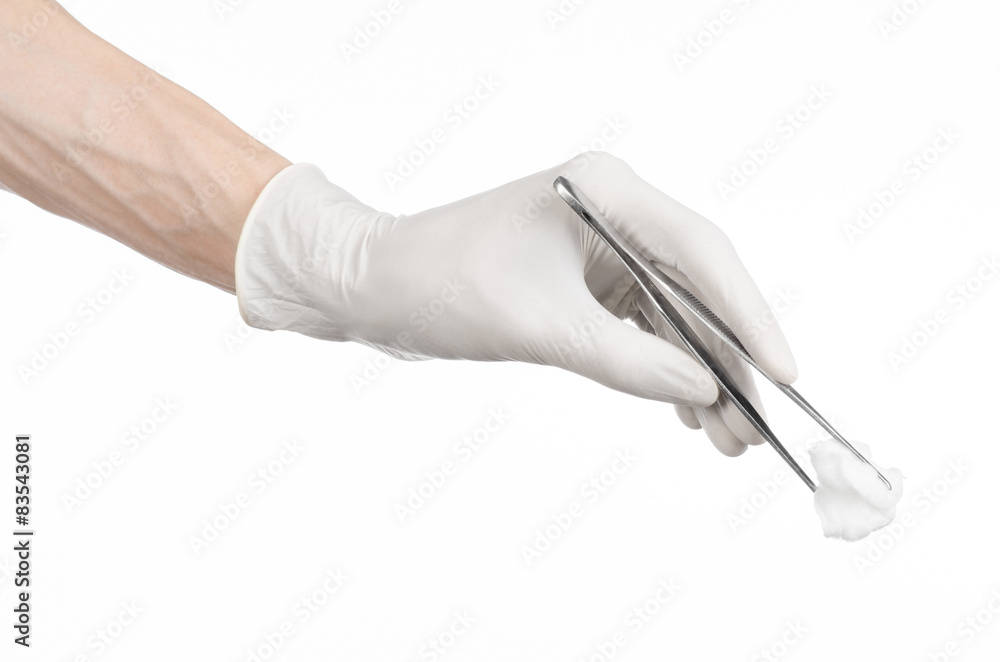 doctor's hand holding tweezers with swab isolated studio doctor's hand holding tweezers with swab isolated studio